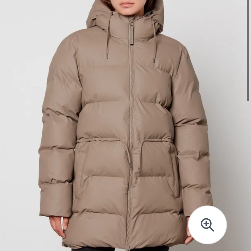 Very Gently used Rains puffer jacket in size XS/S see tag for size references